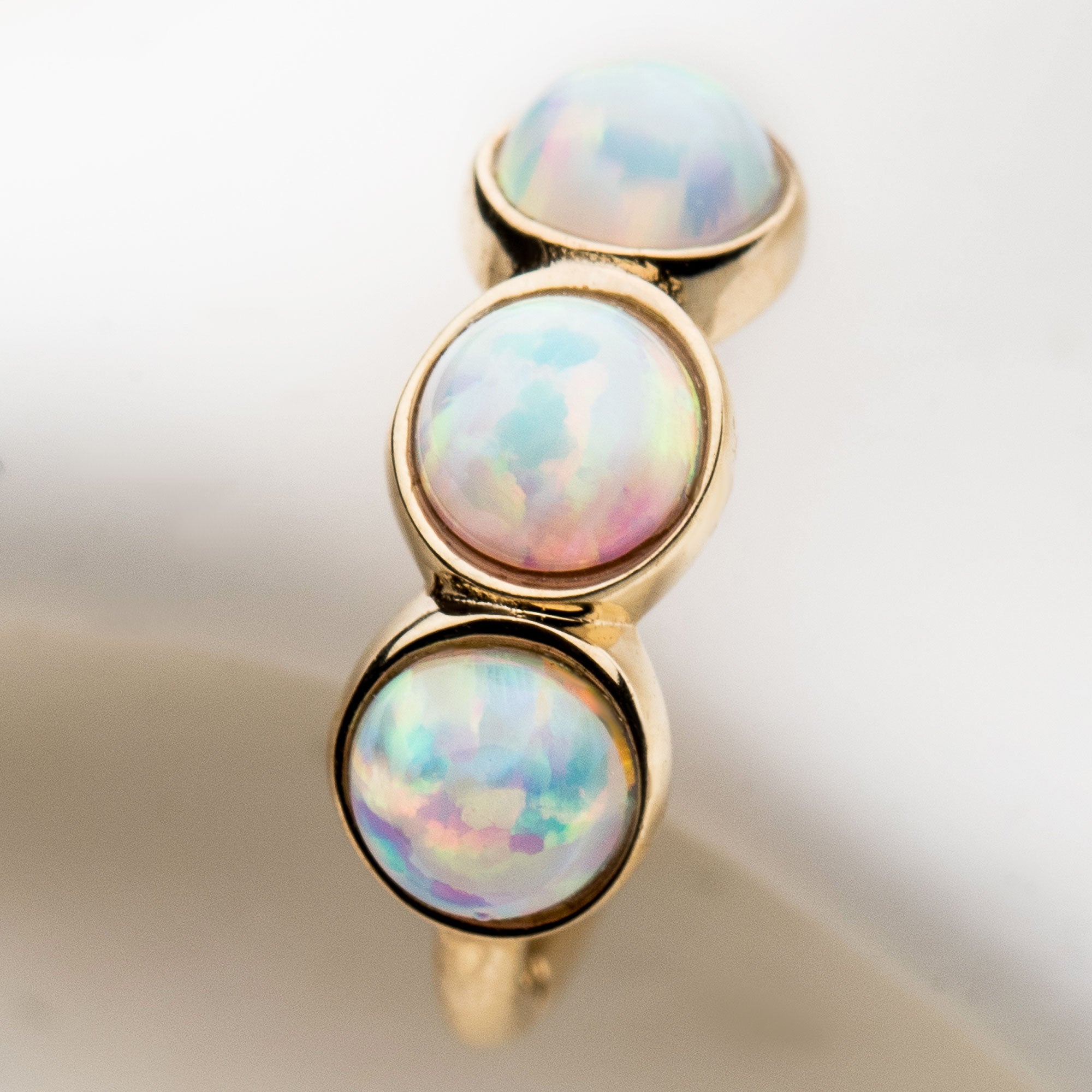 14kt Gold Clustered White Synthetic Opal Side Facing Hinged Segment Clicker